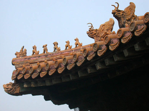 Carved animals on a roof